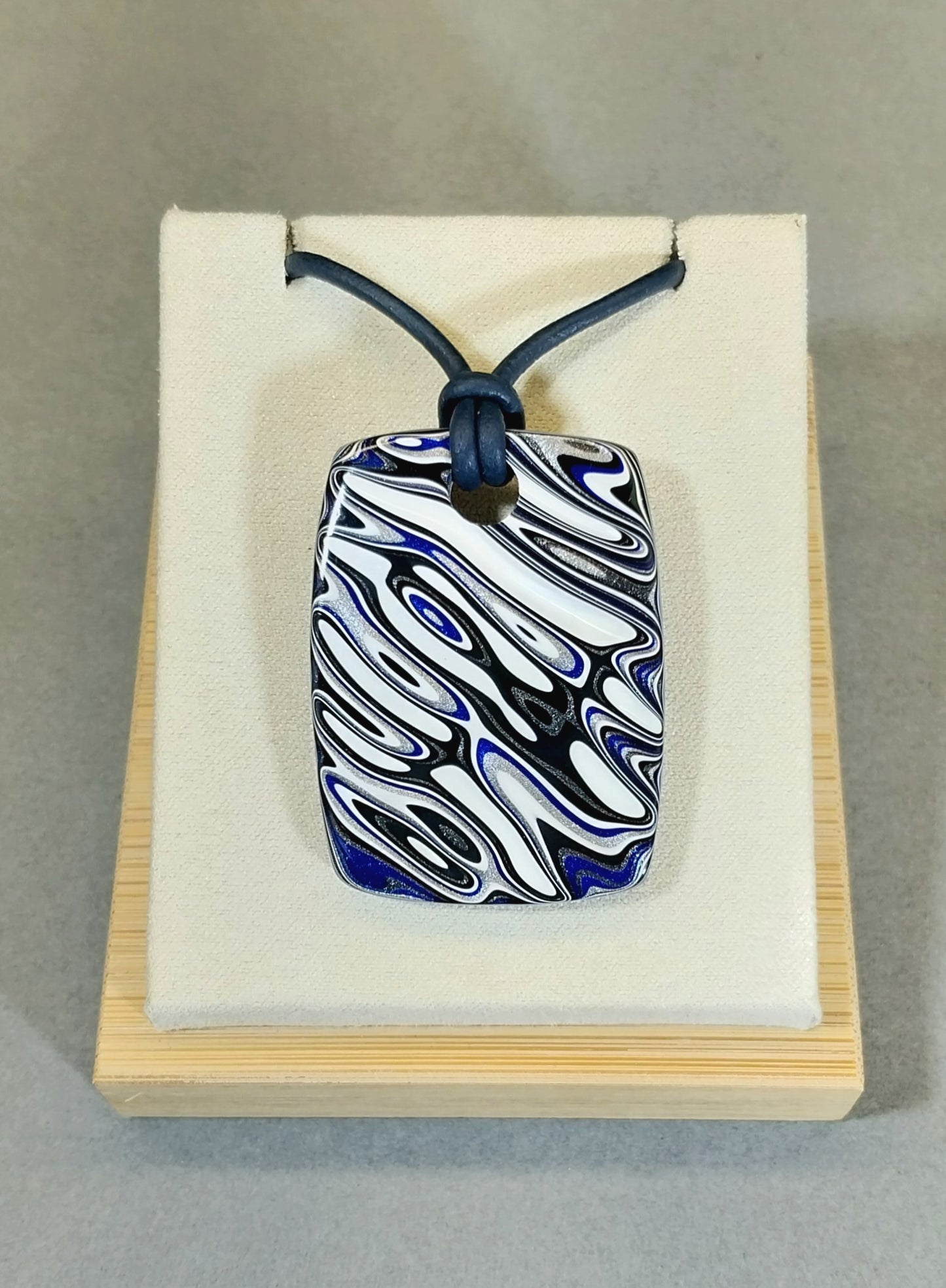 Large Fordite Necklace, Reversible, Black Leather Cord, Beautiful Colors!