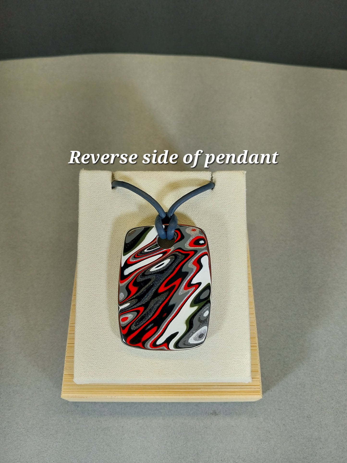 Large Fordite Necklace, Reversible, Black Leather Cord, Beautiful Colors!