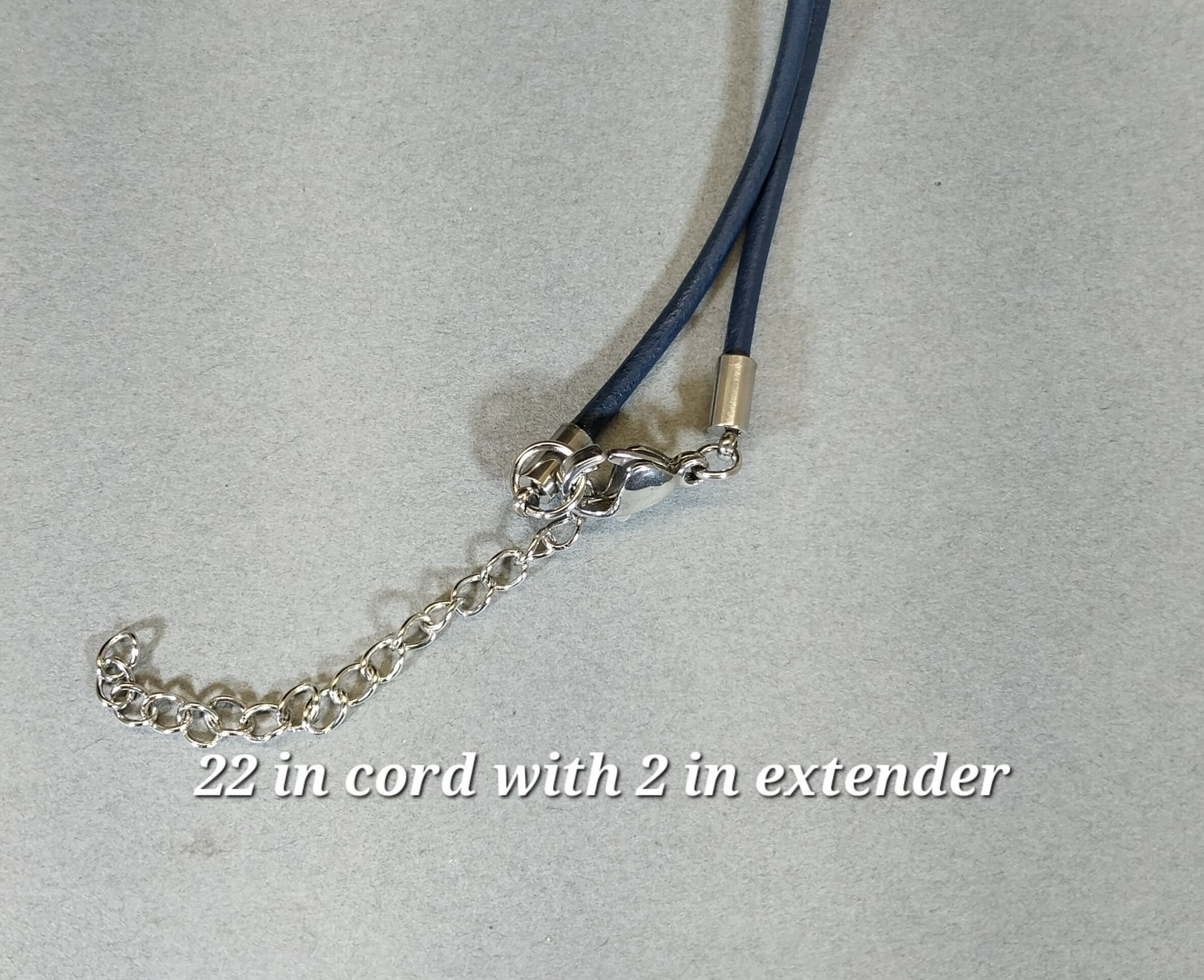 Large Fordite Necklace, Reversible, Black Leather Cord, Beautiful Colors!