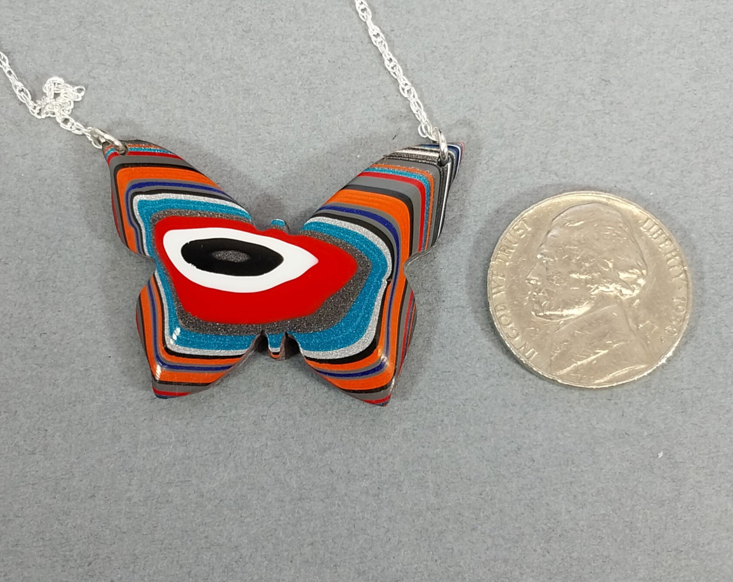 Fordite Necklace a Colorful Reversible Butterfly