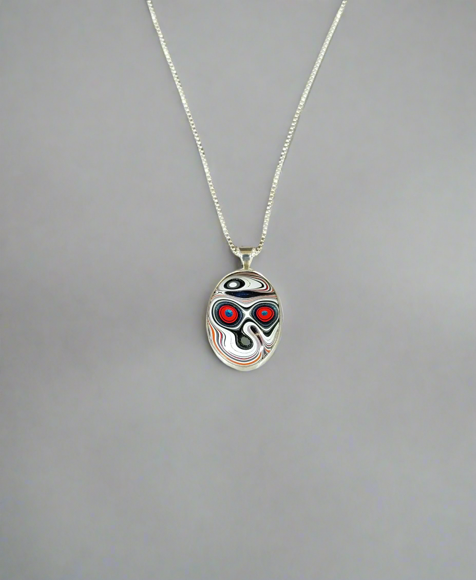 Fordite Necklace in Solid Silver Day of the Dead Skull Pattern