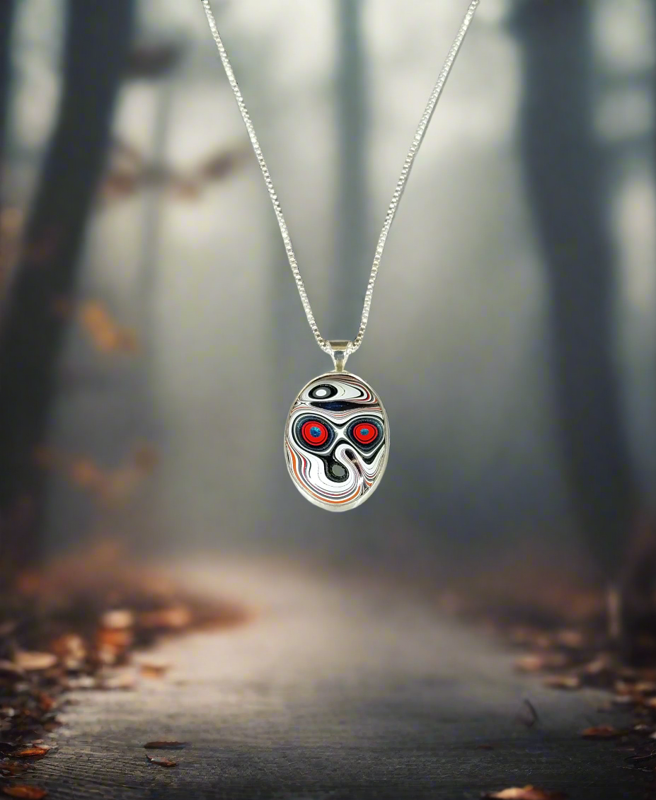 Fordite Necklace in Solid Silver Day of the Dead Skull Pattern