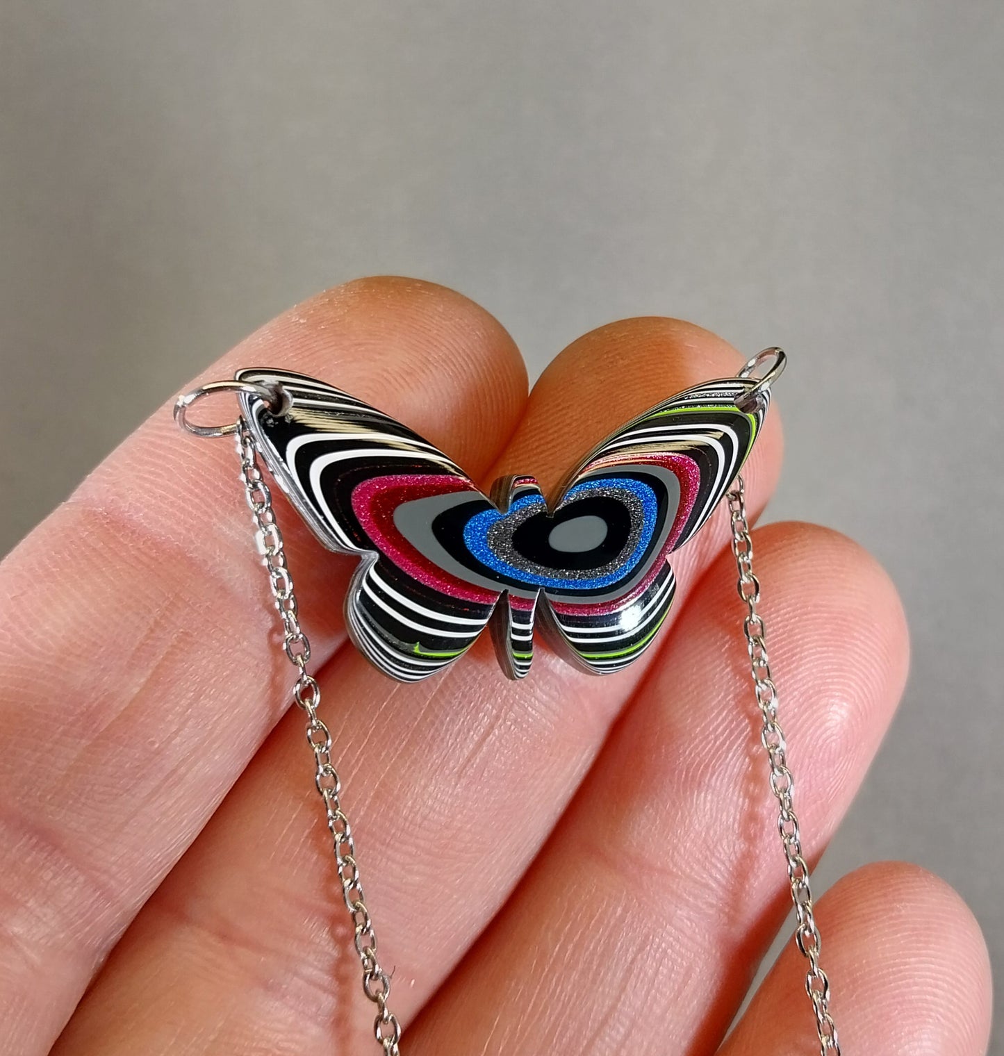 Fordite Necklace a Colorful Reversible Butterfly with Pink and Green, W/O W204