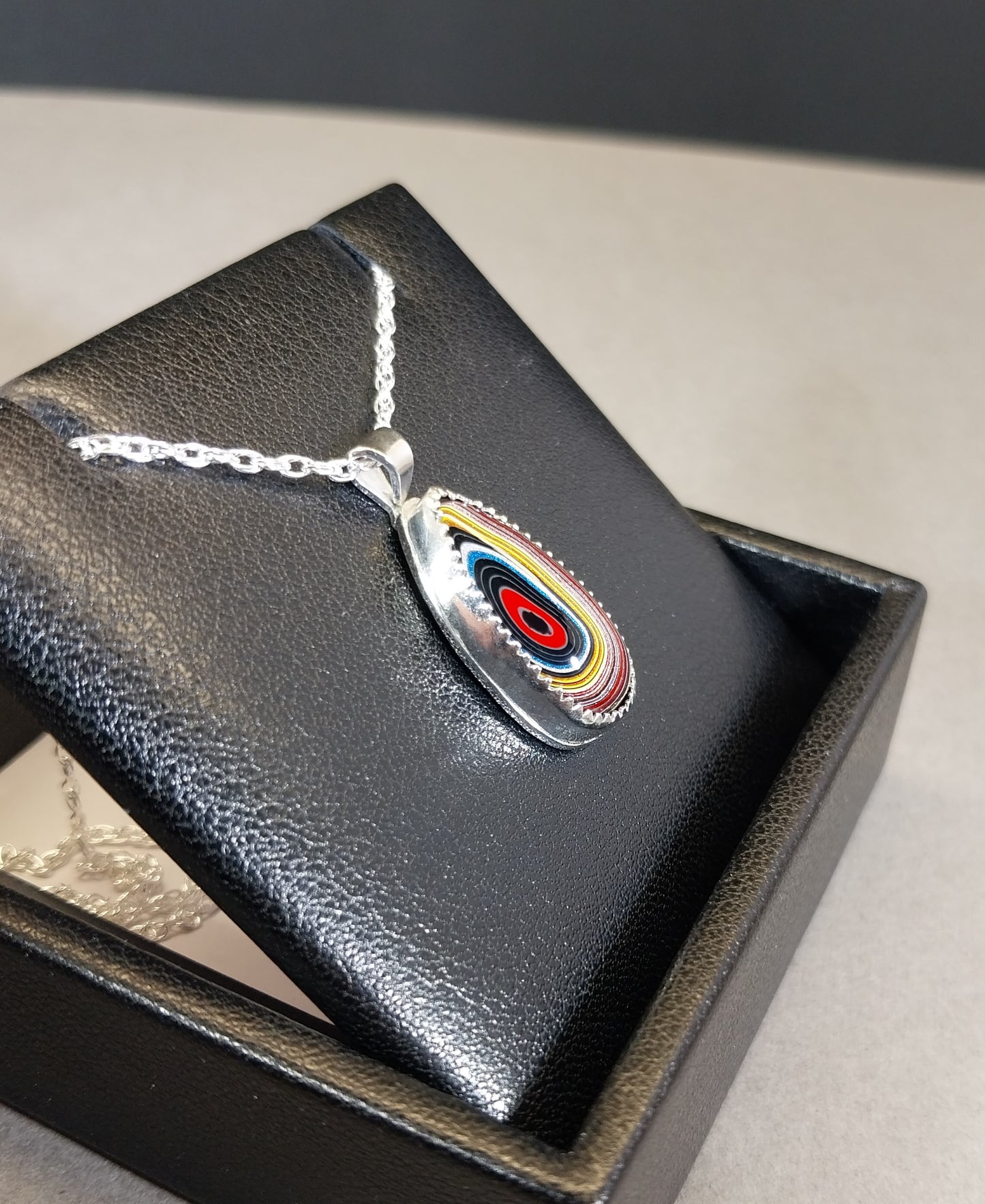Corvetteite- Fordite Pendant in Solid Sterling Silver
