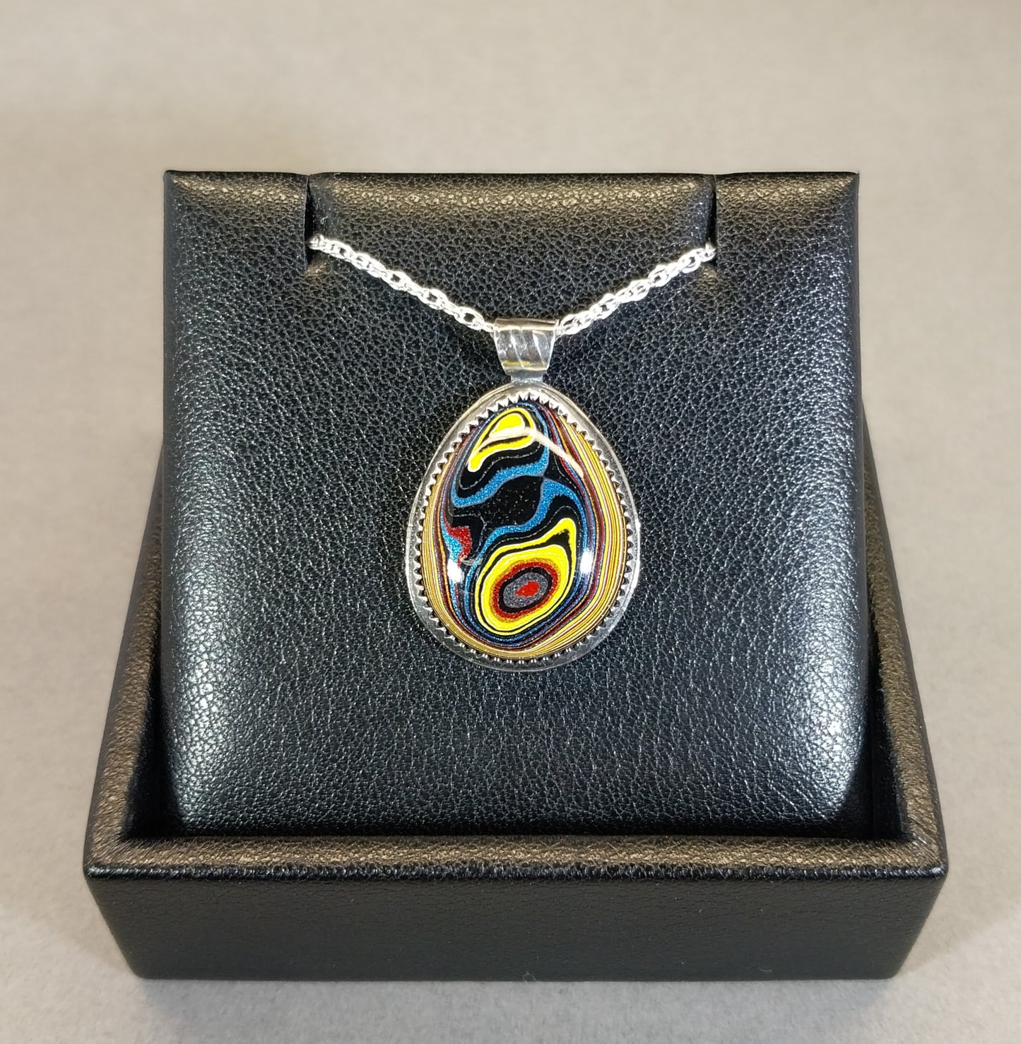 Handcrafted Fordite Necklace Featuring Corvetteite fordite
