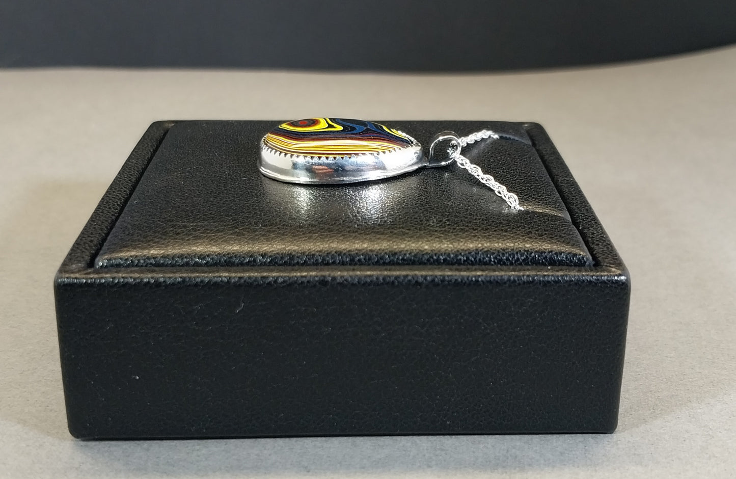 Handcrafted Fordite Necklace Featuring Corvetteite fordite