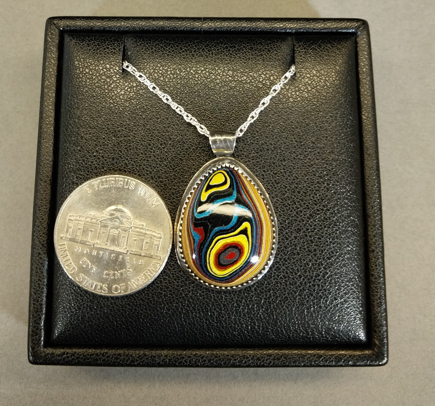Handcrafted Fordite Necklace Featuring Corvetteite fordite
