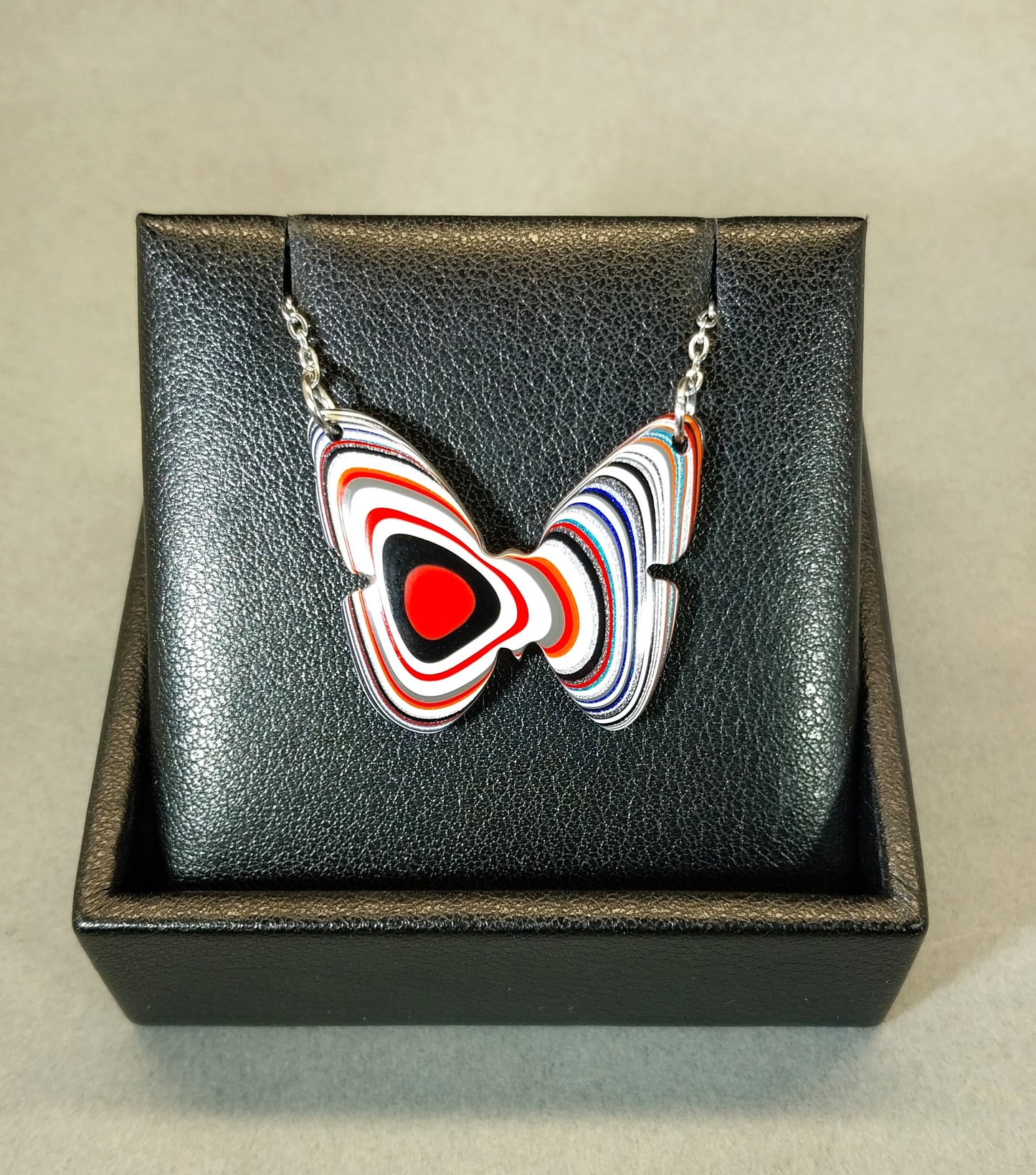 Fordite Necklace a Colorful Reversible Butterfly
