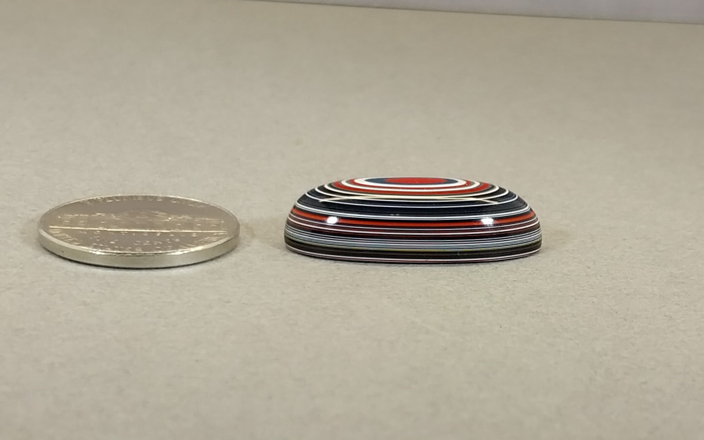 Oval Fordite Cabochon, Red White and Blue