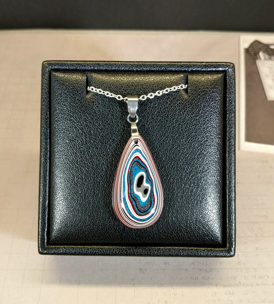 Fordite Necklace Great Colors in a Domed Teardrop