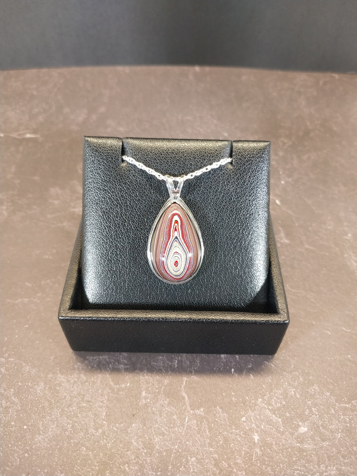 Handcrafted Fordite Necklace Featuring Corvetteite fordite