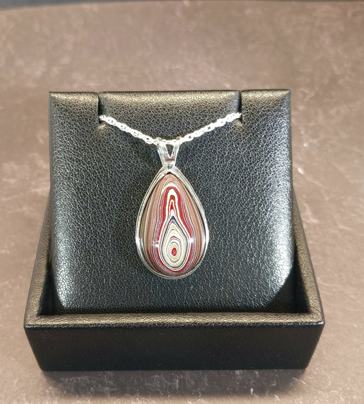 Handcrafted Fordite Necklace Featuring Corvetteite fordite