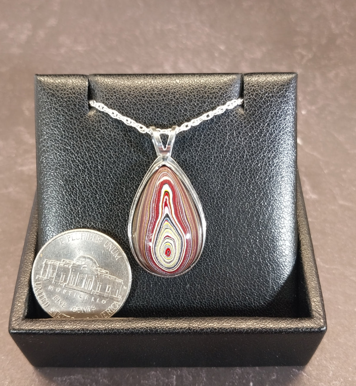 Handcrafted Fordite Necklace Featuring Corvetteite fordite