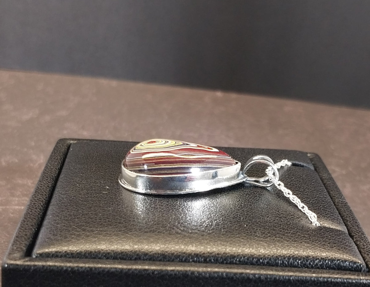Handcrafted Fordite Necklace Featuring Corvetteite fordite