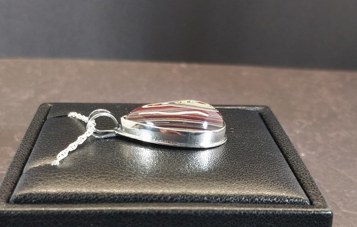Handcrafted Fordite Necklace Featuring Corvetteite fordite