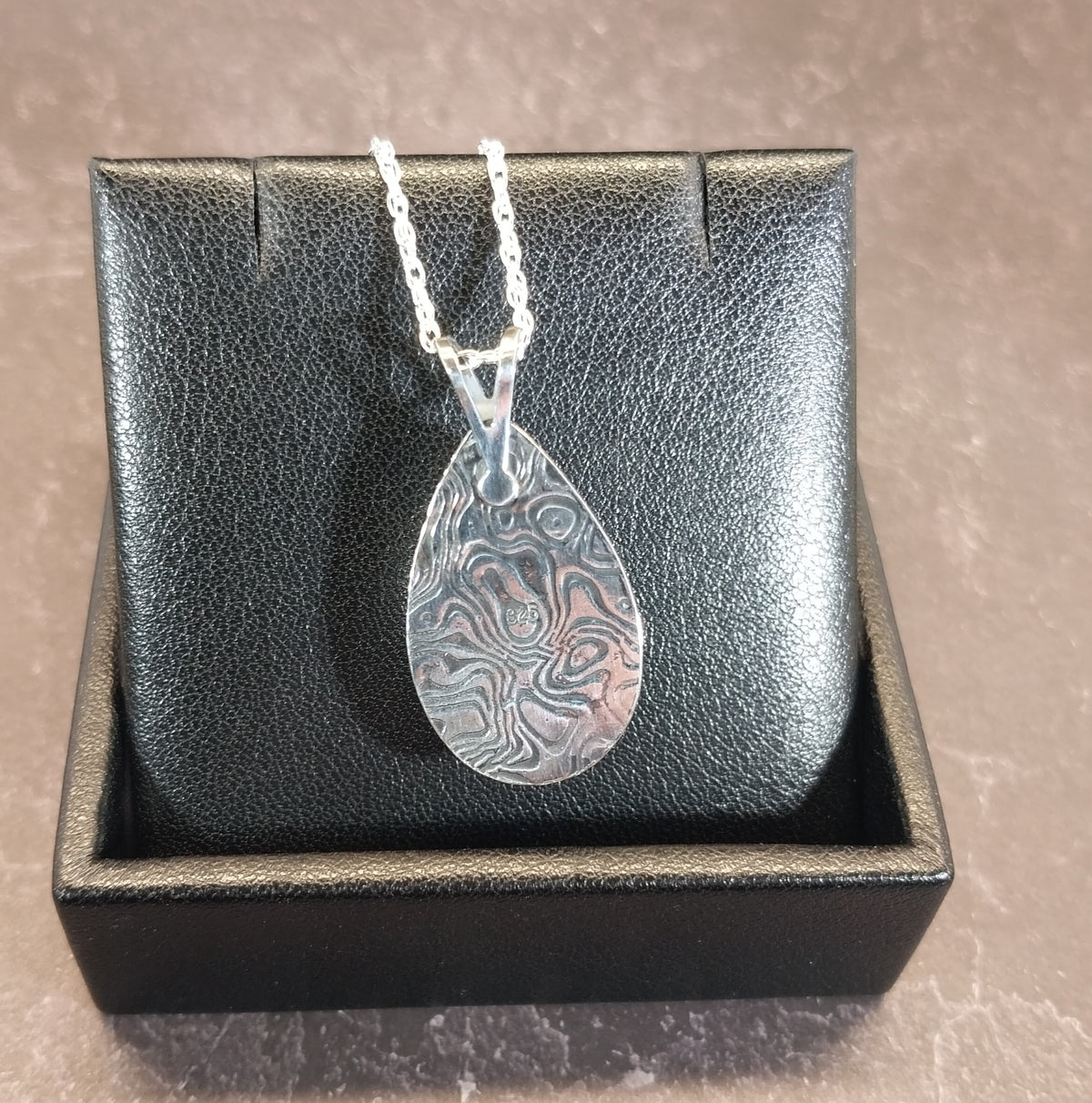 Handcrafted Fordite Necklace Featuring Corvetteite fordite