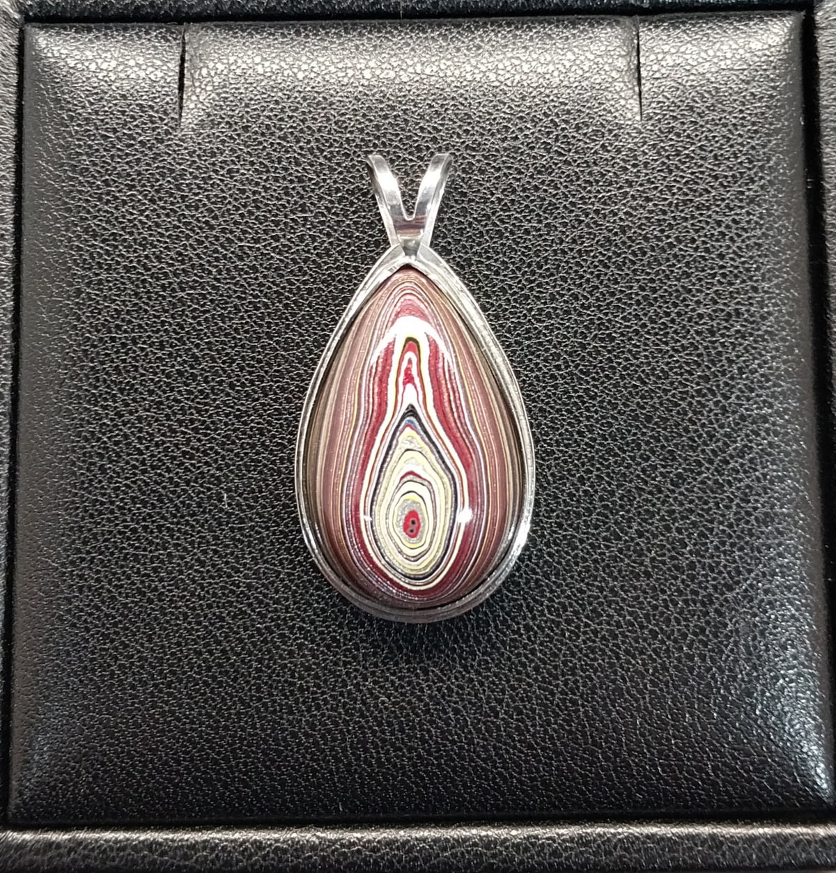 Handcrafted Fordite Necklace Featuring Corvetteite fordite