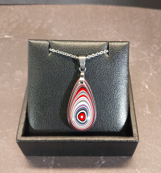 Fordite Necklace Great Colors in a Domed Teardrop