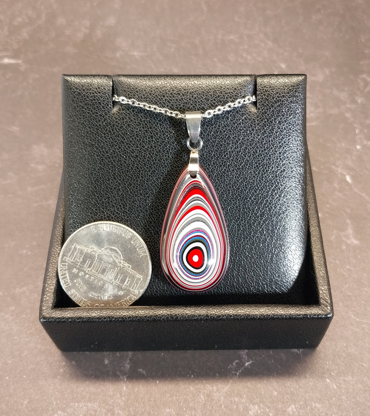 Fordite Necklace Great Colors in a Domed Teardrop