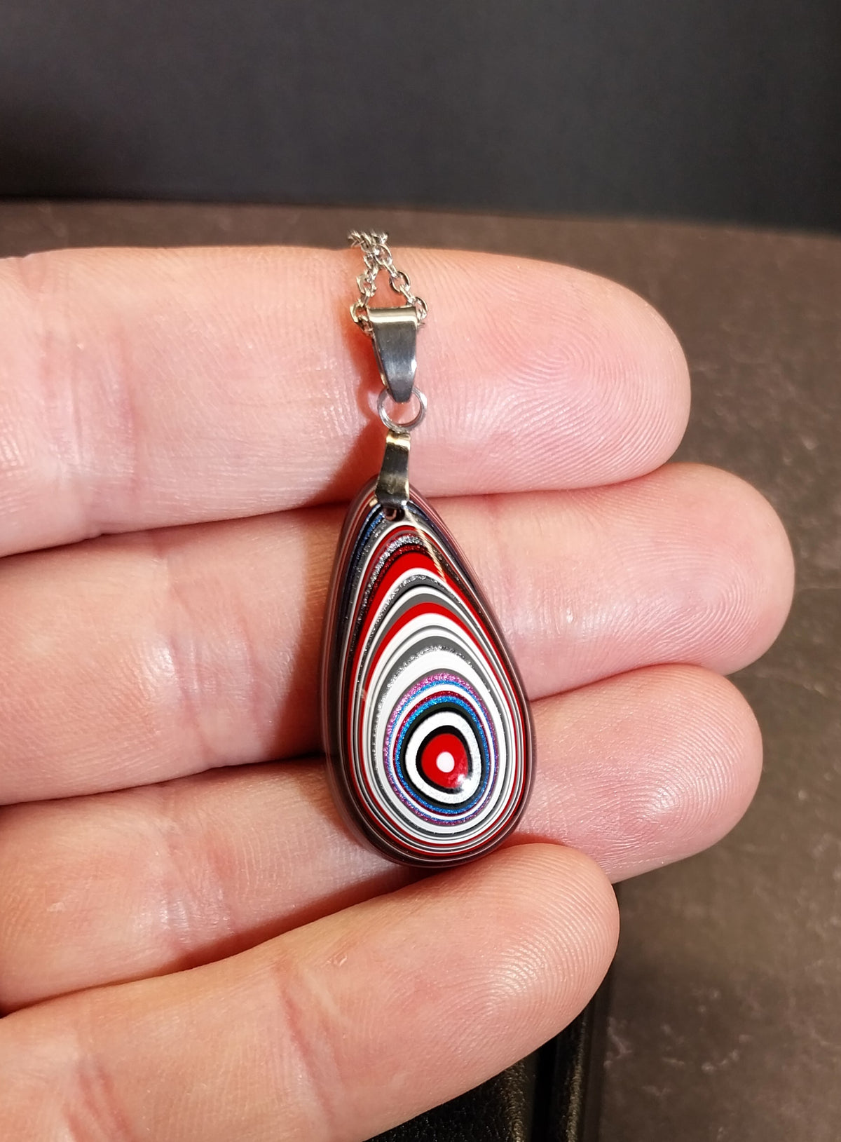 Fordite Necklace Great Colors in a Domed Teardrop