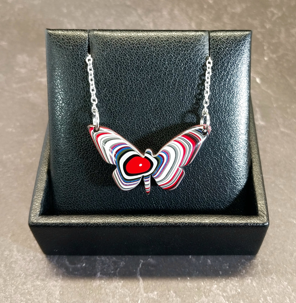 Fordite Necklace a Colorful Reversible Butterfly