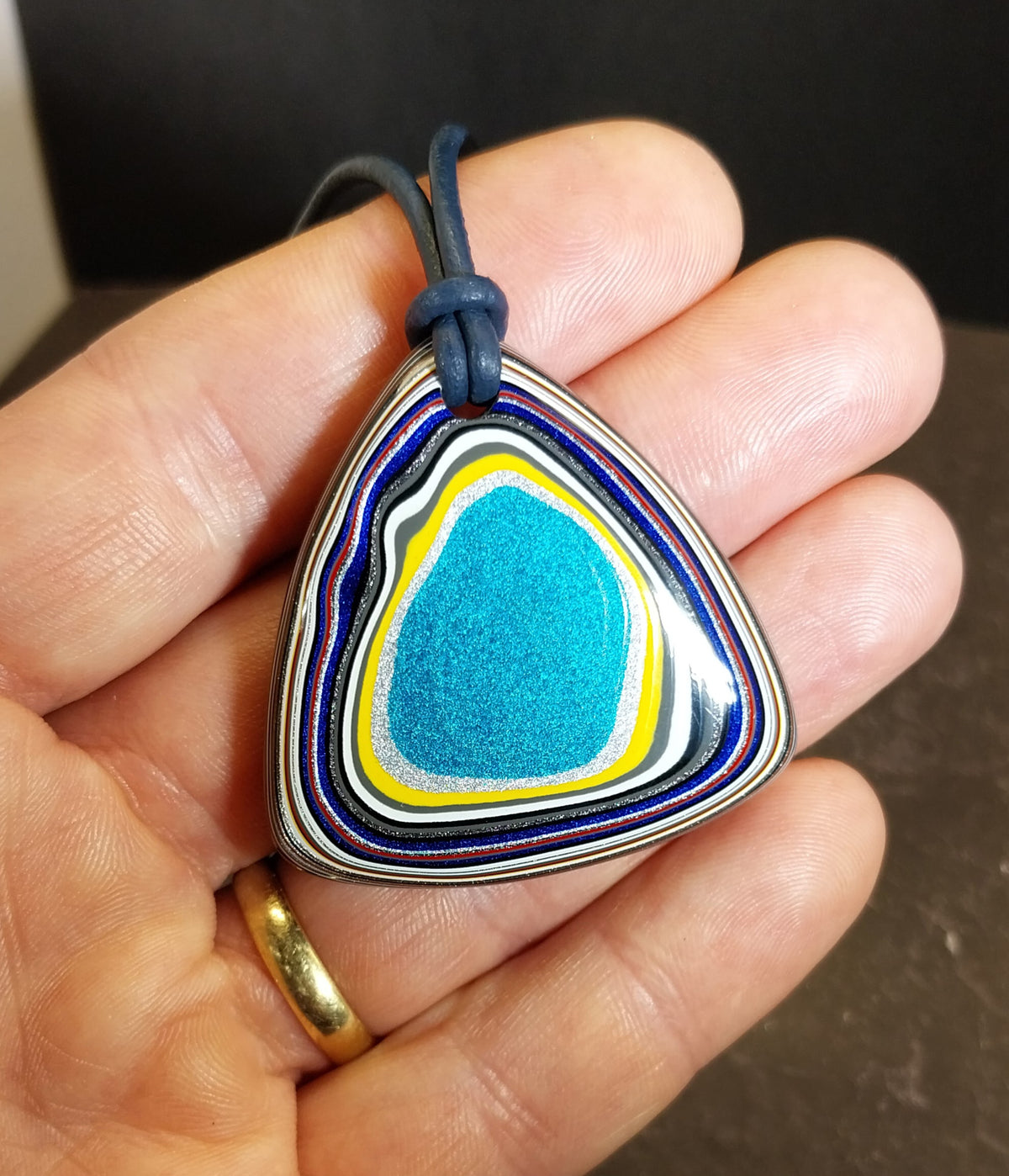 Fordite Necklace with Blue Leather Cord